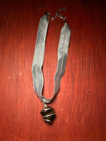 Shiny silver band with energy stone choker